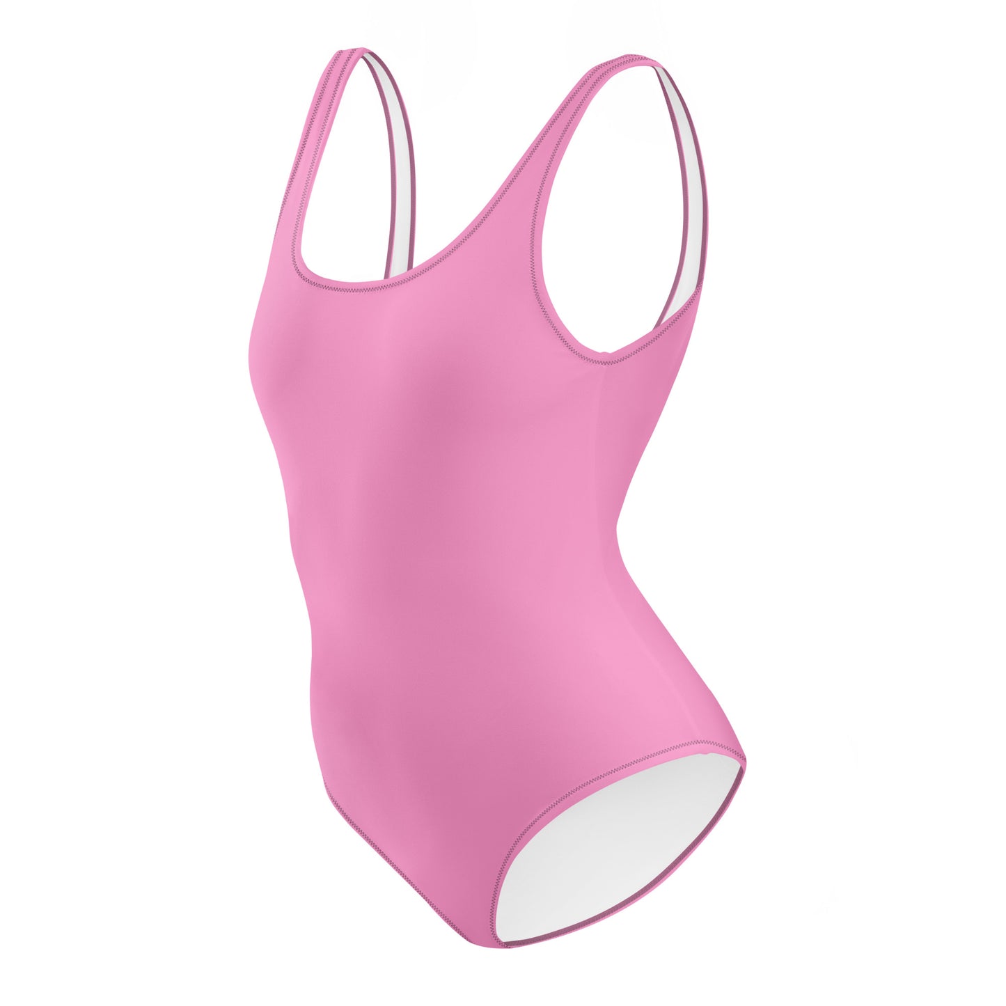 AMMOR PARIS pink one‑piece swimsuit with wide supportive straps and a clean scoop neckline, photographed on a deep black background to emphasize its sculpting minimal silhouette, recycled luxury fabric and the brand’s elevated Paris‑born sustainable swimwear craftsmanship.