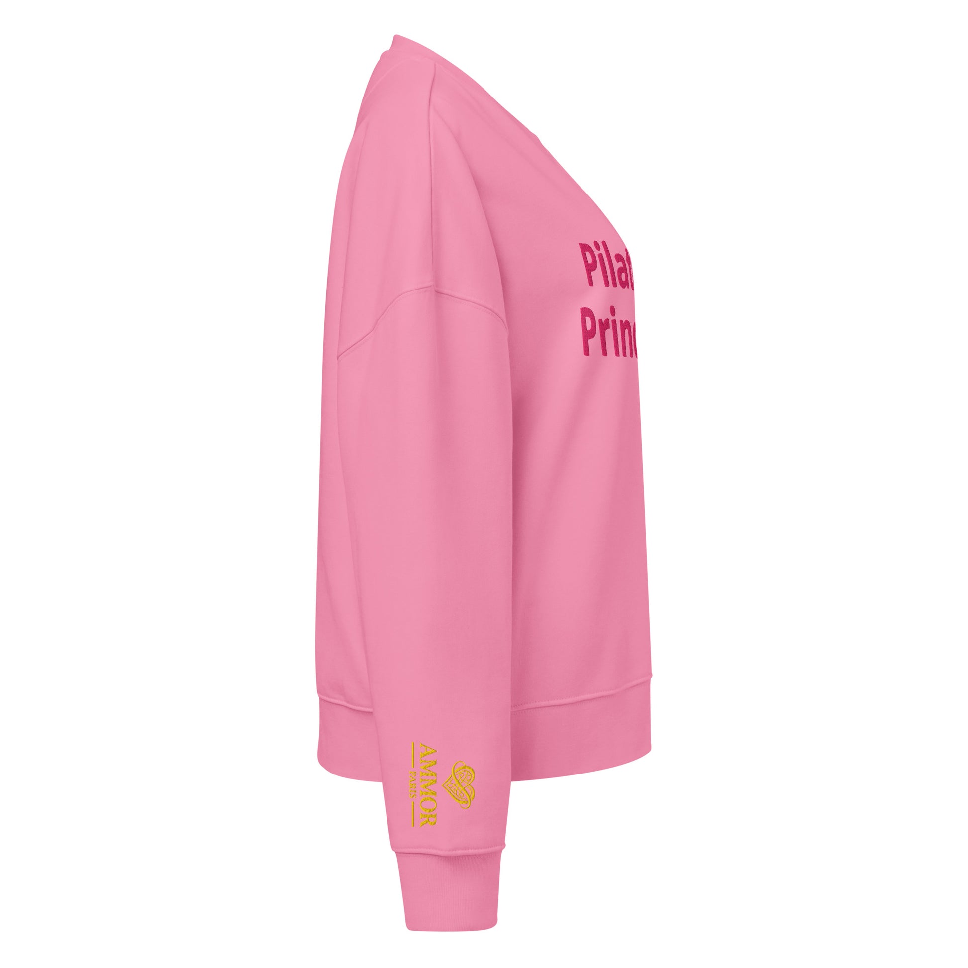 AMMOR PARIS women’s organic crew neck sweatshirt with the “Pilates Princess” text on the front, displayed on a clean background, featuring a relaxed regular fit, dropped shoulders and a super‑soft brushed fleece interior; crafted from organic cotton and recycled materials to highlight its cozy, sustainable, everyday‑wear design that reflects the wellness‑focused, eco‑friendly athleisure aesthetic of AMMOR PARIS, ideal for pilates lovers, loungewear outfits, casual streetwear looks and premium basics; design